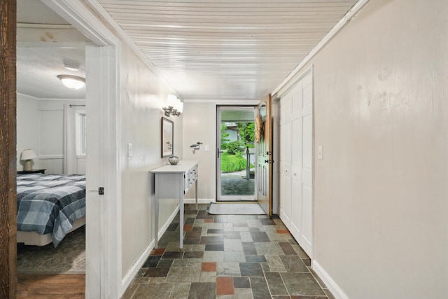 33-34 Gerber Ln, Monmouth, ME 04259 - entrance foyer featuring stone tile floors and crown molding