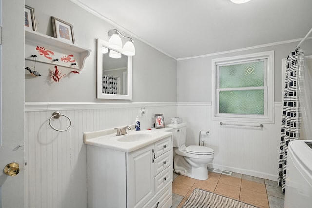 33-34 Gerber Ln, Monmouth, ME 04259 - full bathroom with vanity, a wainscoted wall, tile patterned flooring, independent washer and dryer, and a shower with shower curtain