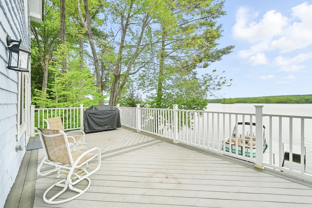 33-34 Gerber Ln, Monmouth, ME 04259 - wooden terrace featuring a grill
