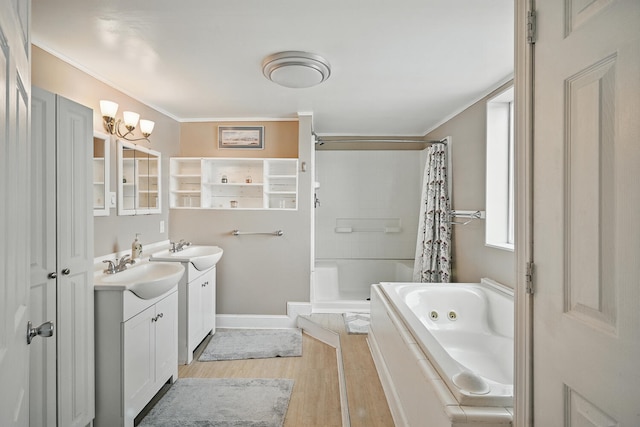33-34 Gerber Ln, Monmouth, ME 04259 - full bath featuring vanity, wood finished floors, and crown molding
