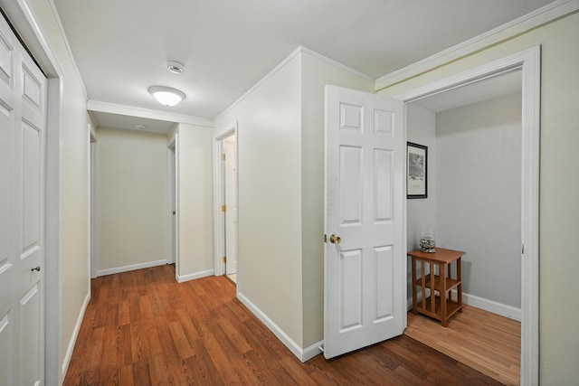 33-34 Gerber Ln, Monmouth, ME 04259 - hall with dark wood-style floors and ornamental molding