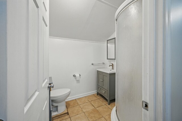 33-34 Gerber Ln, Monmouth, ME 04259 - full bath with vanity, lofted ceiling, a shower stall, and tile patterned flooring
