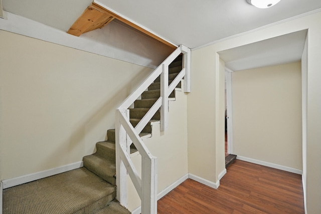33-34 Gerber Ln, Monmouth, ME 04259 - staircase with wood finished floors and baseboards