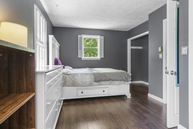 7 Dumas St, Lisbon, ME 04252 - bedroom featuring wood finished floors and a textured ceiling