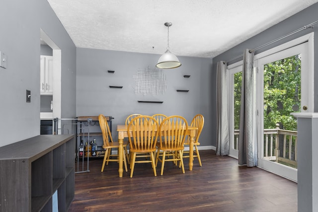 7 Dumas St, Lisbon, ME 04252 - dining area with dark wood finished floors and a textured ceiling