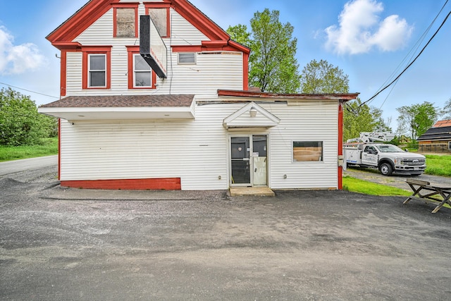 23 Main St, Athens, ME 04912 - rear view of property with roof with shingles