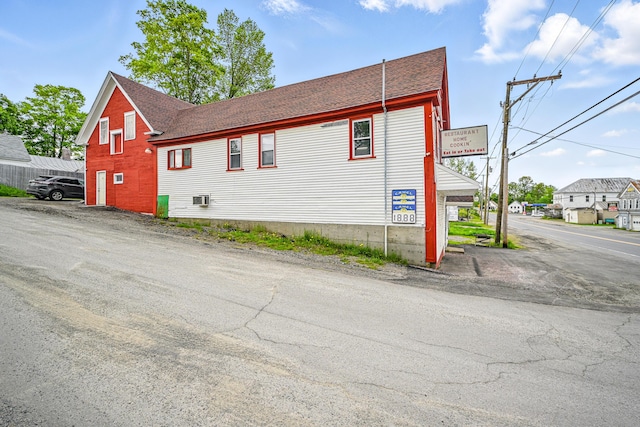 23 Main St, Athens, ME 04912 - view of side of home featuring a shingled roof