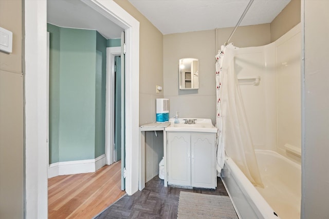 133 Front St, Old Town, ME 04468 - bathroom featuring vanity, shower / bath combination with curtain, and parquet floors