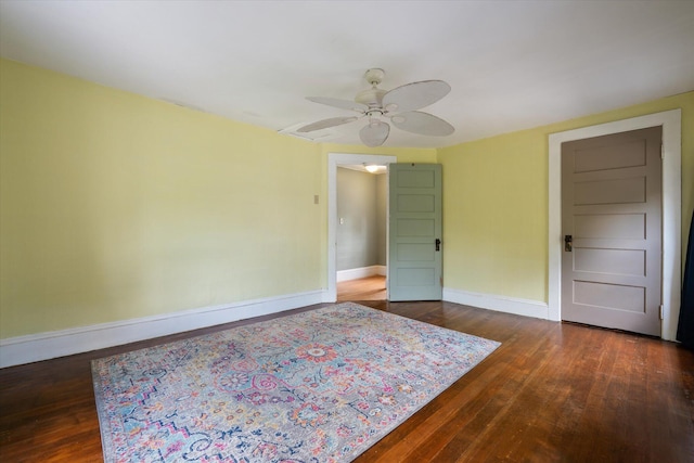 133 Front St, Old Town, ME 04468 - unfurnished bedroom with dark wood-style flooring and ceiling fan