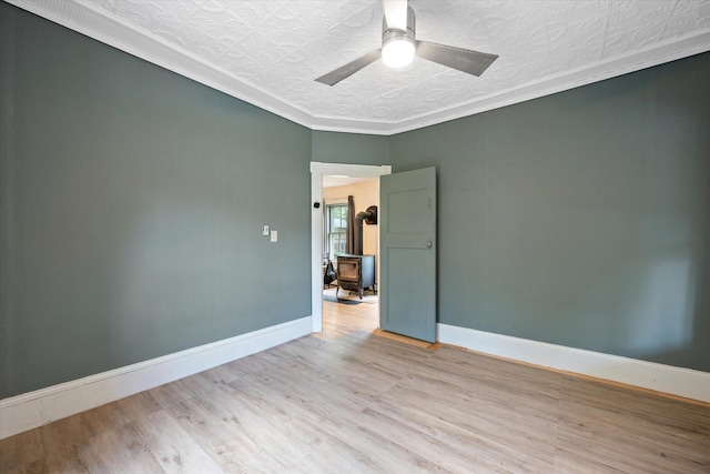 133 Front St, Old Town, ME 04468 - spare room with wood finished floors, ceiling fan, and ornamental molding