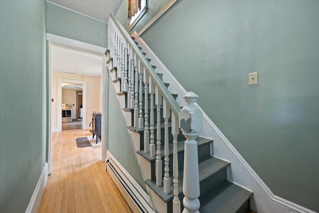 133 Front St, Old Town, ME 04468 - stairs with hardwood / wood-style floors and baseboards