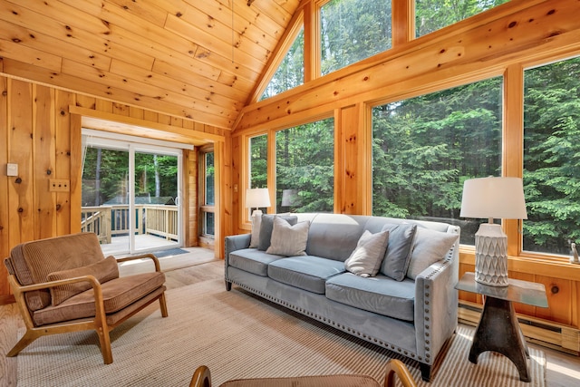 12 Michaud Ln, Bridgton, ME 04009 - living area with lofted ceiling, wood walls, wood finished floors, and wooden ceiling