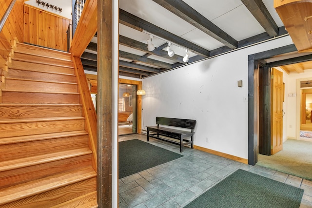 12 Michaud Ln, Bridgton, ME 04009 - staircase with beamed ceiling and baseboards