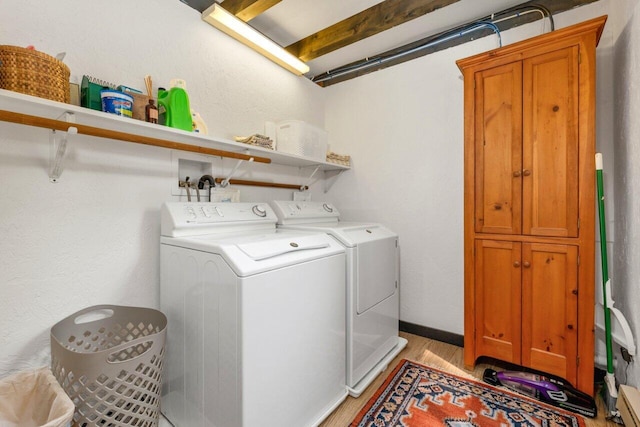 12 Michaud Ln, Bridgton, ME 04009 - laundry area featuring separate washer and dryer and light wood-style flooring