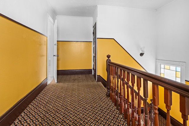 22 Union St, Biddeford, ME 04005 - hallway featuring carpet, crown molding, baseboards, and an upstairs landing