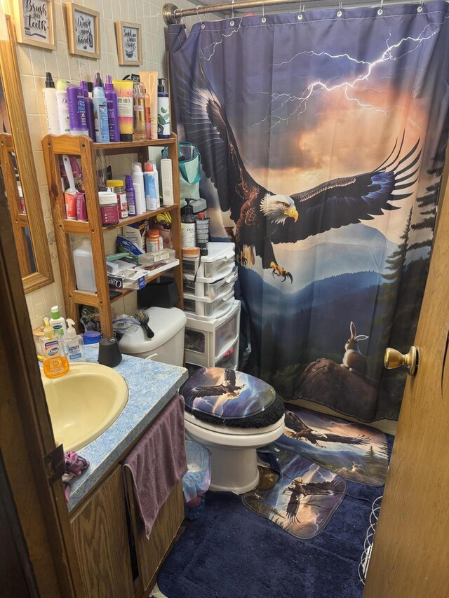 55 Cindy Blodgett Dr, Clinton, ME 04927 - bathroom featuring toilet, vanity, and a shower with curtain