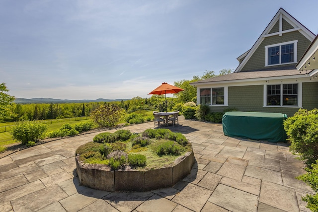 321 Beech Hill Rd, Northport, ME 04849 - view of patio / terrace with outdoor dining area and a mountain view