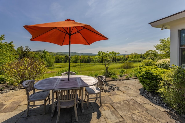 321 Beech Hill Rd, Northport, ME 04849 - view of patio / terrace with outdoor dining space and a mountain view