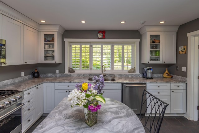 321 Beech Hill Rd, Northport, ME 04849 - kitchen with appliances with stainless steel finishes, a sink, glass insert cabinets, recessed lighting, and white cabinetry
