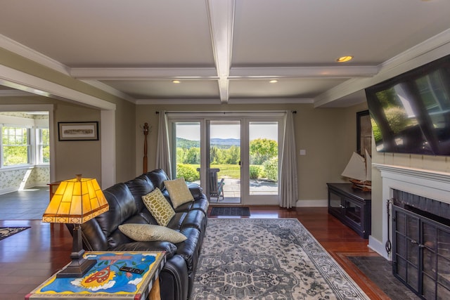 321 Beech Hill Rd, Northport, ME 04849 - living room with wood finished floors, beam ceiling, a fireplace with flush hearth, baseboards, and recessed lighting