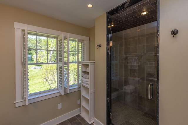 321 Beech Hill Rd, Northport, ME 04849 - bathroom featuring a shower stall, baseboards, tile patterned floors, and recessed lighting