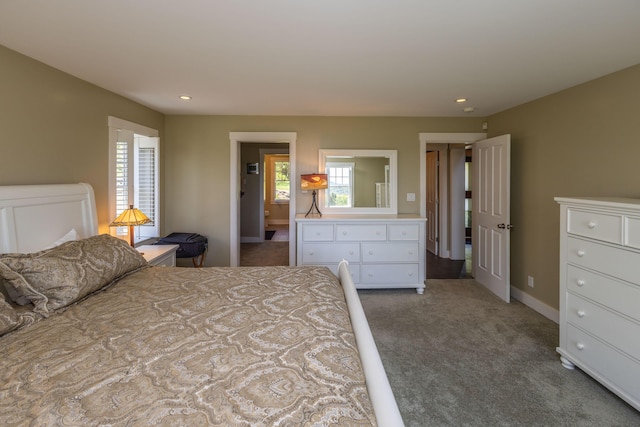 321 Beech Hill Rd, Northport, ME 04849 - carpeted bedroom with multiple windows, baseboards, and recessed lighting