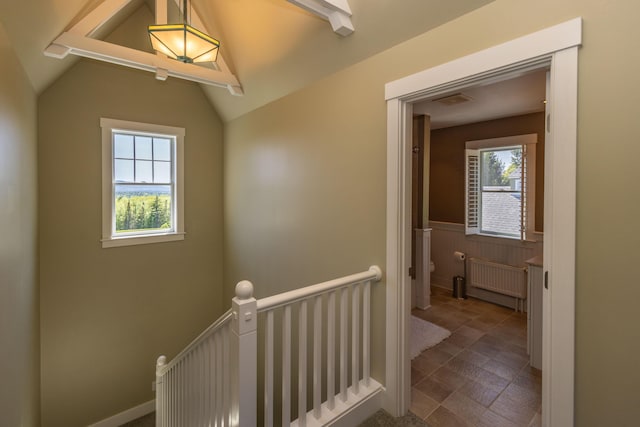 321 Beech Hill Rd, Northport, ME 04849 - hall featuring an upstairs landing, radiator, and wainscoting