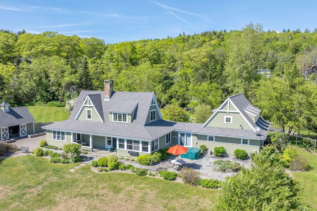 321 Beech Hill Rd, Northport, ME 04849 - view of subject property with a forest