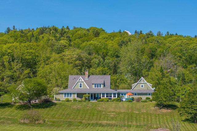 321 Beech Hill Rd, Northport, ME 04849 - view of subject property with a heavily wooded area