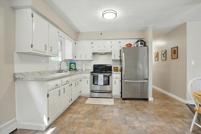 46 Jeffrey St, Lewiston, ME 04240 - kitchen featuring stainless steel appliances, a sink, a baseboard heating unit, under cabinet range hood, and decorative backsplash