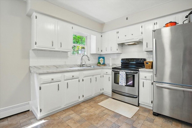 46 Jeffrey St, Lewiston, ME 04240 - kitchen with appliances with stainless steel finishes, a sink, tasteful backsplash, and under cabinet range hood