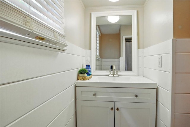 46 Jeffrey St, Lewiston, ME 04240 - bathroom with vanity and a wainscoted wall