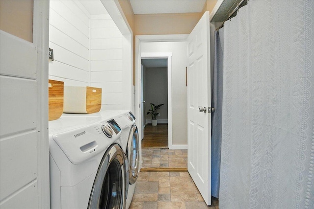 46 Jeffrey St, Lewiston, ME 04240 - washroom with washer and clothes dryer, stone tile flooring, and baseboards