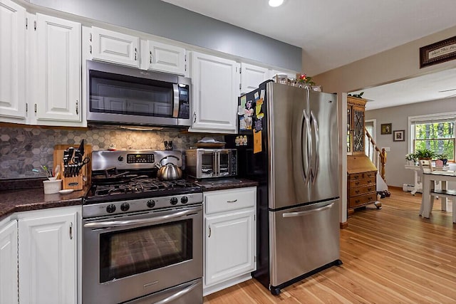 11 Lewis Rd, Sidney, ME 04330 - kitchen featuring stainless steel appliances, white cabinetry, light wood-type flooring, and recessed lighting