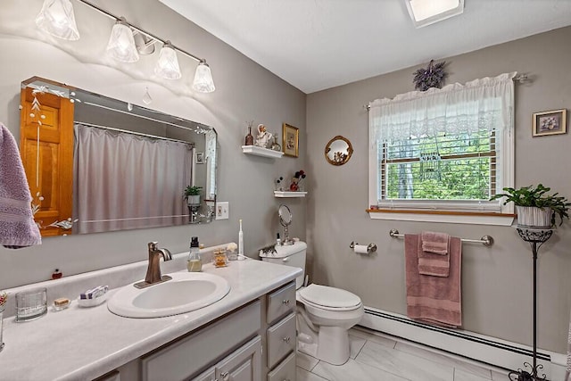 11 Lewis Rd, Sidney, ME 04330 - bathroom featuring a baseboard radiator, vanity, toilet, and a shower with curtain