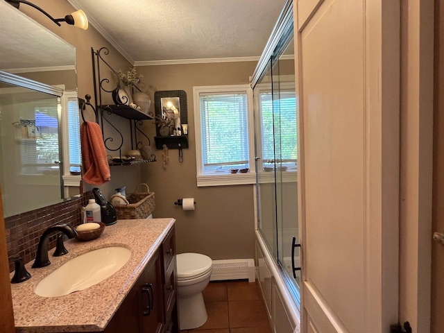 361 Haley Rd, Kittery, ME 03905 - full bathroom featuring baseboard heating, toilet, vanity, tile patterned flooring, and shower / bath combination with glass door