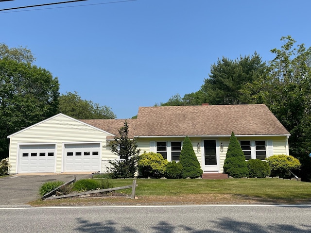 361 Haley Rd, Kittery, ME 03905 - single story home with asphalt driveway, a front lawn, and a garage