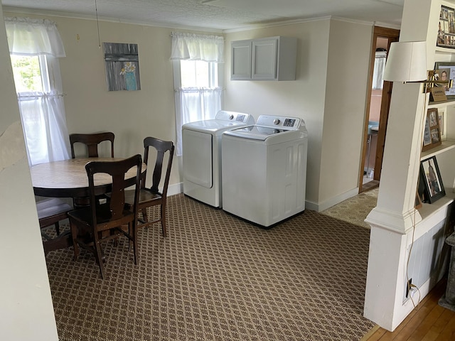 13 Main St, Cambridge, ME 04923 - washroom featuring washing machine and dryer, ornamental molding, carpet floors, and baseboards