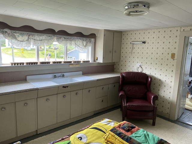 13 Main St, Cambridge, ME 04923 - bedroom with a sink and wallpapered walls