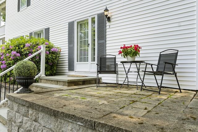 60 Barrell Ln Unit 1, York, ME 03909 - wooden terrace with a patio area