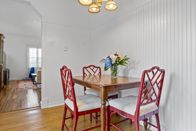 60 Barrell Ln Unit 1, York, ME 03909 - dining space featuring a chandelier and light wood-style floors