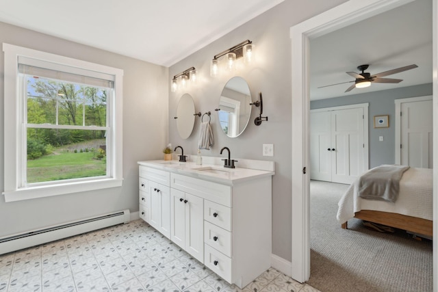 40 Sabatus Ln, Windham, ME 04062 - full bath featuring baseboard heating, double vanity, and a ceiling fan