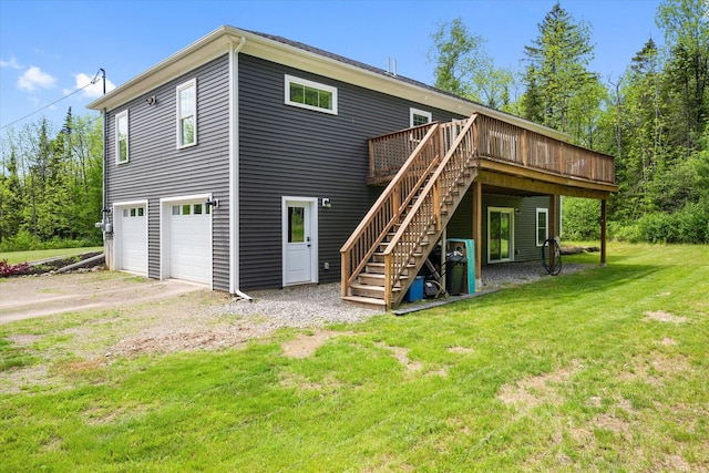 45 Doughty Blvd, Levant, ME 04456 - back of property with a wooden deck, stairway, a yard, an attached garage, and dirt driveway