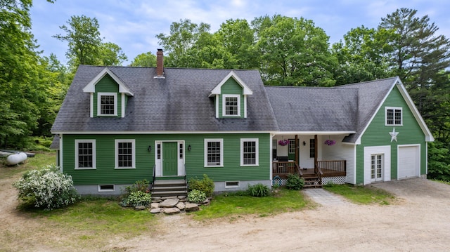 310 Fields Hill Rd, Sumner, ME 04292 - cape cod home with covered porch, driveway, roof with shingles, a chimney, and an attached garage