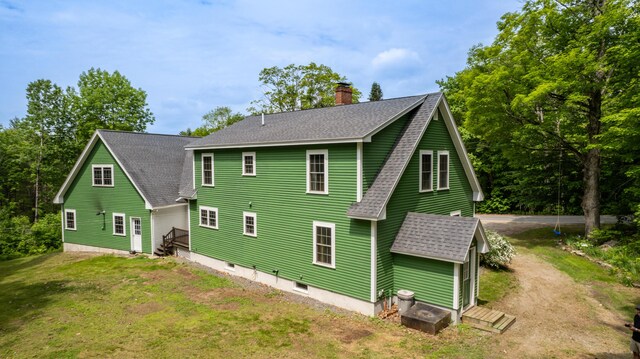 310 Fields Hill Rd, Sumner, ME 04292 - rear view of house featuring a shingled roof, a chimney, dirt driveway, and a yard