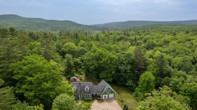 310 Fields Hill Rd, Sumner, ME 04292 - aerial view of property and surrounding area featuring a heavily wooded area