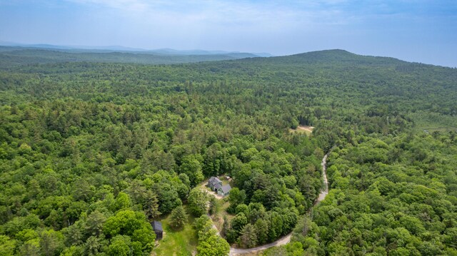 310 Fields Hill Rd, Sumner, ME 04292 - drone / aerial view of a forest and a mountain backdrop