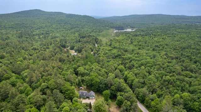 310 Fields Hill Rd, Sumner, ME 04292 - drone / aerial view of a forest and mountains