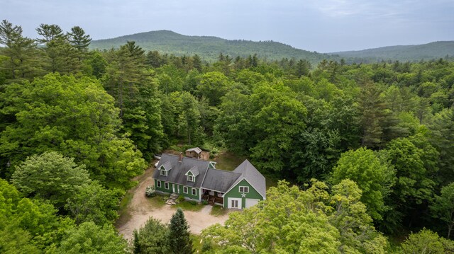 310 Fields Hill Rd, Sumner, ME 04292 - aerial view of property and surrounding area with a heavily wooded area