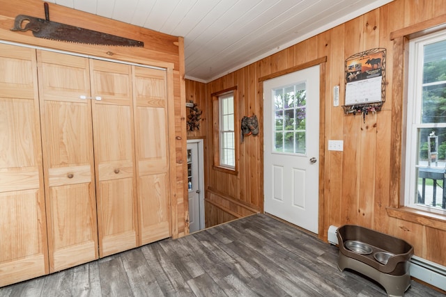 310 Fields Hill Rd, Sumner, ME 04292 - foyer entrance featuring wood walls, a baseboard heating unit, and wood finished floors